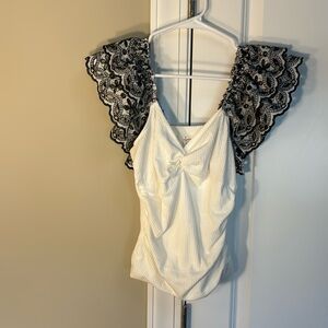 Anthropologie black and white ruffle top